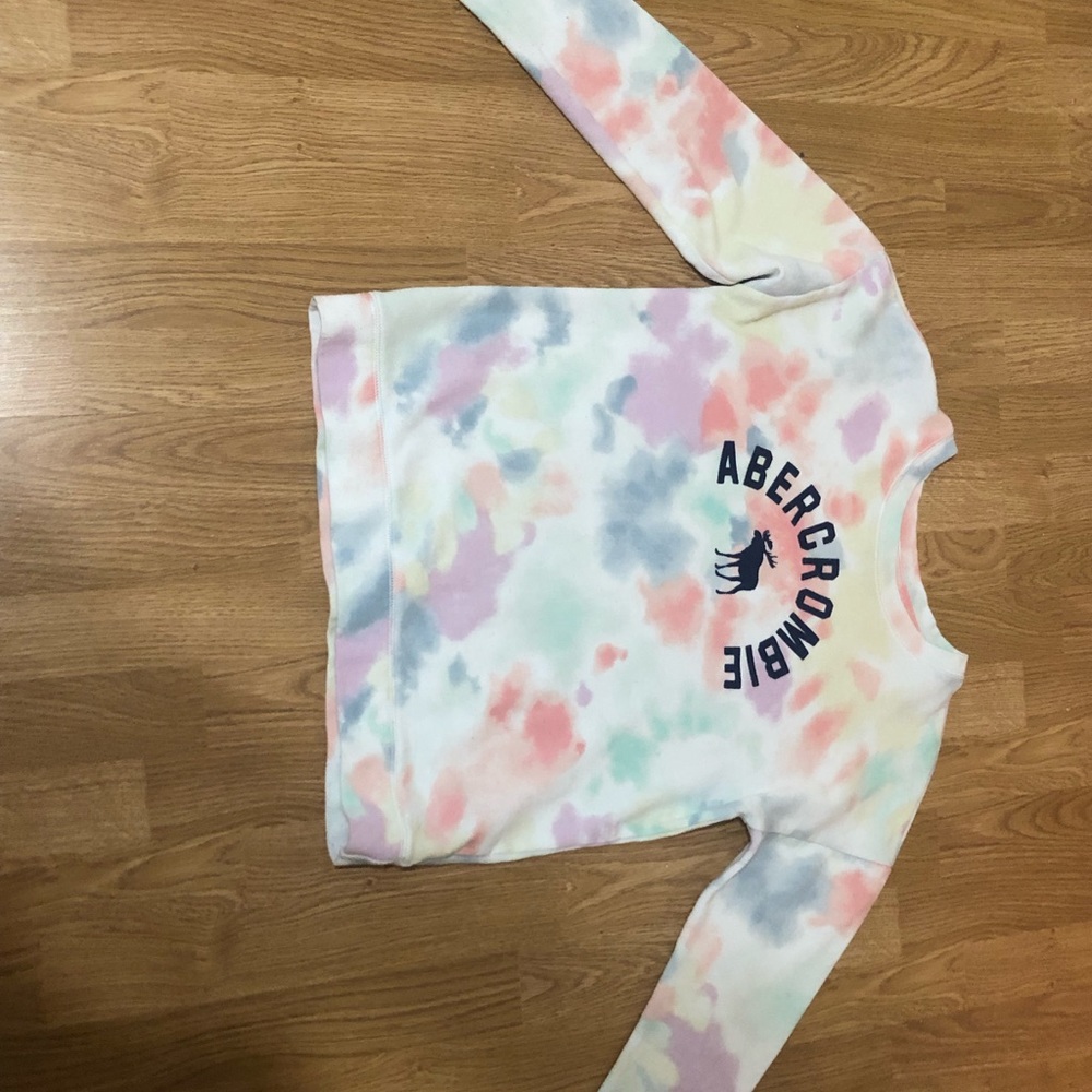 An Abercrombie kids long sleeve shirt.